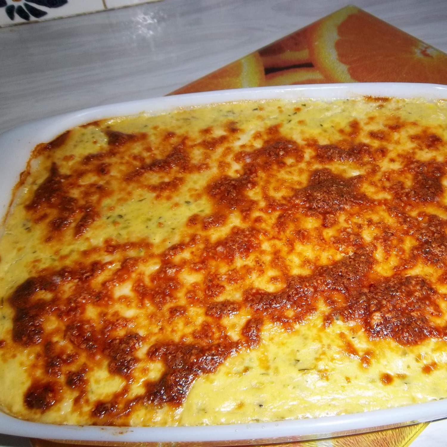 Gratin de courgettes râpées aux lardons